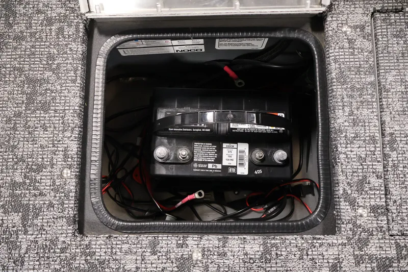 Slide: The Image of Battery compartment of 2025 Tracker Pro Guide V-175 WT boat, featuring wiring and connections. - 40