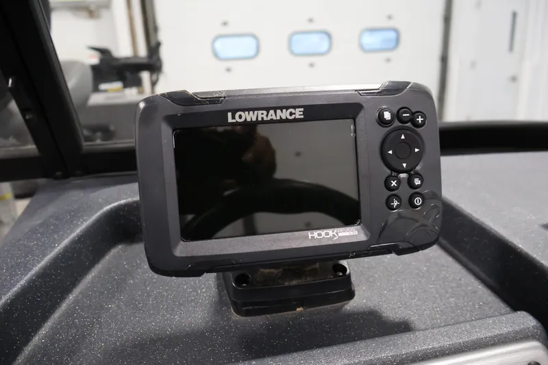 Slide: The Image of Lowrance Hook Reveal fish finder on 2025 Tracker Pro Guide V-175 WT boat dashboard. - 24