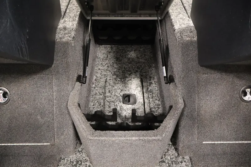 Slide: The Image of Interior view of 2025 Tracker Pro Guide V-175 WT boat storage compartment. - 19