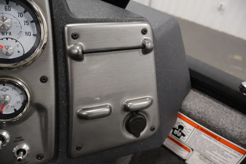 Slide: The Image of Dashboard of 2025 Tracker Pro Guide V-175 WT boat with gauges and controls. - 27