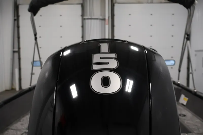 Slide: The Image of 2025 Tracker Pro Guide V-175 WT boat engine with "150" horsepower label. - 47