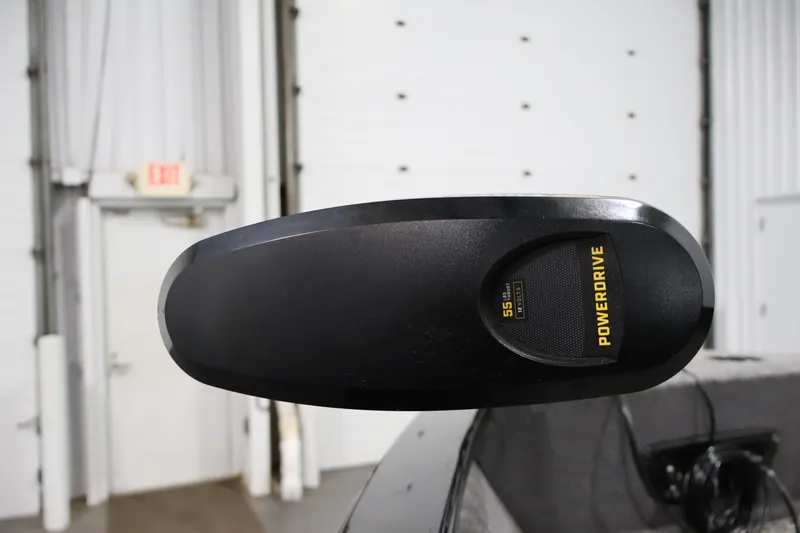 Slide: The Image of PowerDrive motor on 2025 Tracker Pro Guide V-175 WT boat in a garage setting. - 12