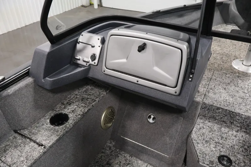 Slide: The Image of 2025 Tracker Pro Guide V-175 WT boat interior with storage compartment and seating area. - 31