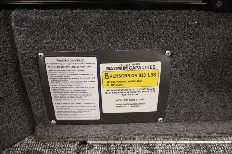 Slide: The Image of 2025 Tracker Pro Guide V-175 WT capacity plate, 6 persons or 838 lbs limit. - 28