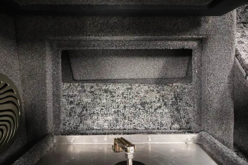 Slide: The Image of Interior view of 2025 Tracker Pro Guide V-175 WT boat storage compartment. - 34