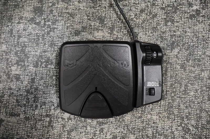 Slide: The Image of Minn Kota foot pedal on carpet, compatible with 2025 Tracker Pro Guide V-175 WT. - 14