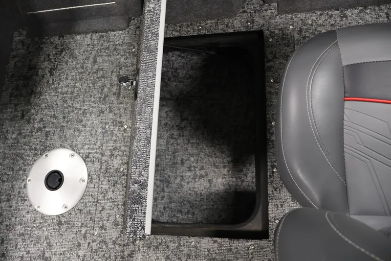 Slide: The Image of 2025 Tracker Pro Guide V-175 WT boat interior with storage compartment and seat. - 30