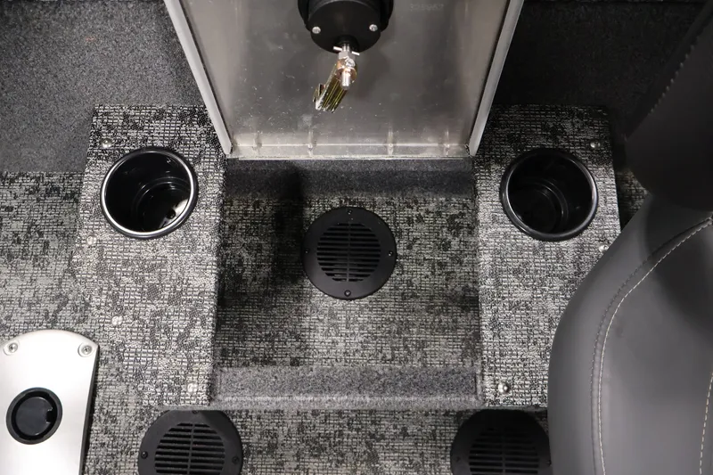 Slide: The Image of Interior of 2025 Tracker Pro Guide V-175 WT boat with cup holders and carpeted flooring. - 38