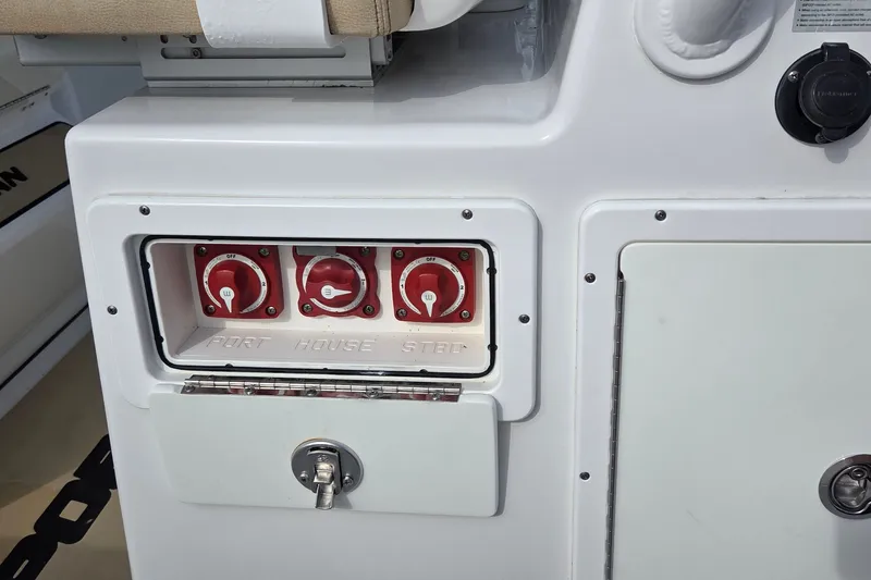Slide: The Image of Control panel of a 2018 Sportsman Open 312 Center Console boat. - 21