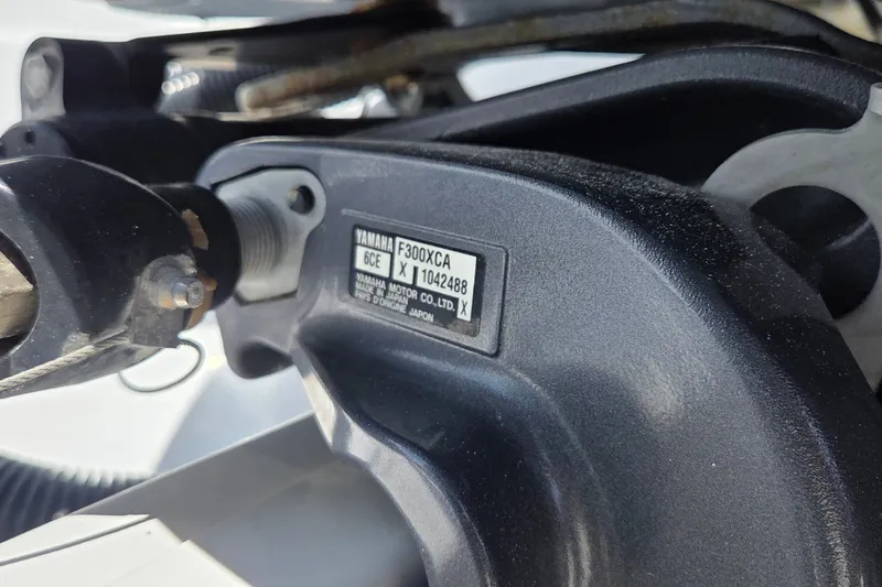 Slide: The Image of Close-up of Yamaha F300XCA engine part on 2018 Sportsman Open 312 Center Console. - 29