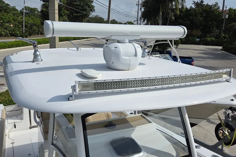 Slide: The Image of 2018 Sportsman Open 312 Center Console boat with radar and LED light bar. - 27