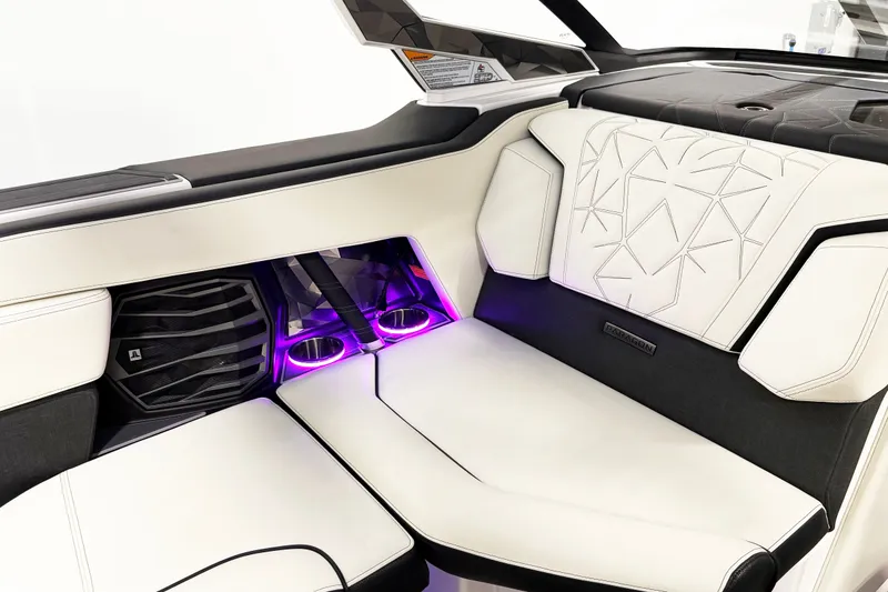 Slide: The Image of 2023 Nautique Super Air Nautique G23 Paragon interior with luxurious seating and ambient lighting. - 7