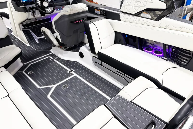 Slide: The Image of 2023 Nautique Super Air Nautique G23 Paragon interior with sleek seating and modern design. - 9