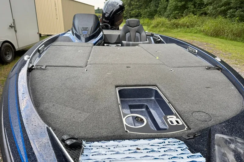 Slide: The Image of 2018 Skeeter FX20 Limited Edition bass boat with spacious deck and storage compartments. - 11