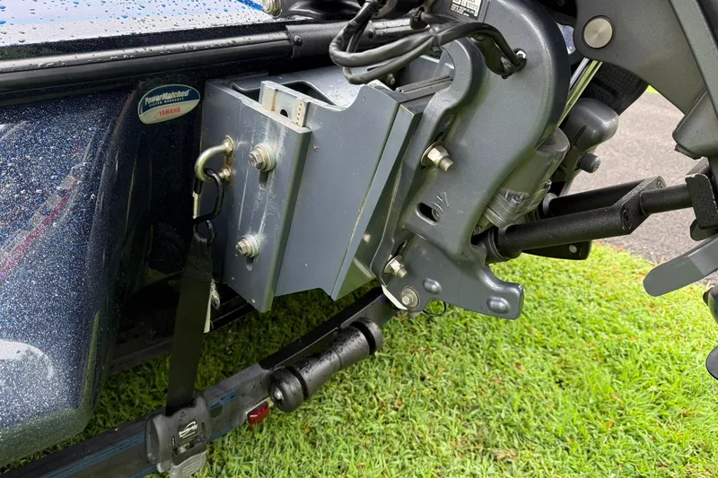 Slide: The Image of Close-up of a 2018 Skeeter FX20 Limited Edition boat motor mount on grass. - 9