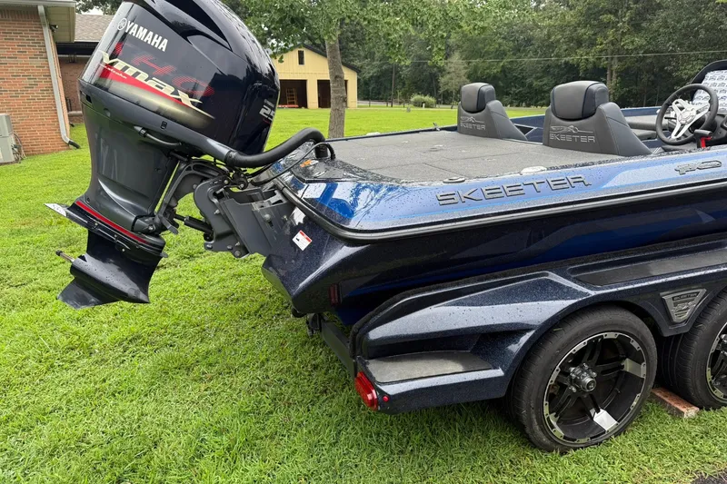 Slide: The Image of 2018 Skeeter FX20 Limited Edition boat with Yamaha VMAX engine on grassy lawn. - 4
