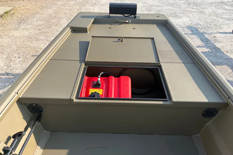 Slide: The Image of 2026 Gator Tail 1748 GATOR boat with open storage compartment and red fuel tank. - 7