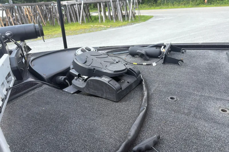 Slide: The Image of 2015 Nitro Z-8 DC boat deck with trolling motor and control pedal. - 13