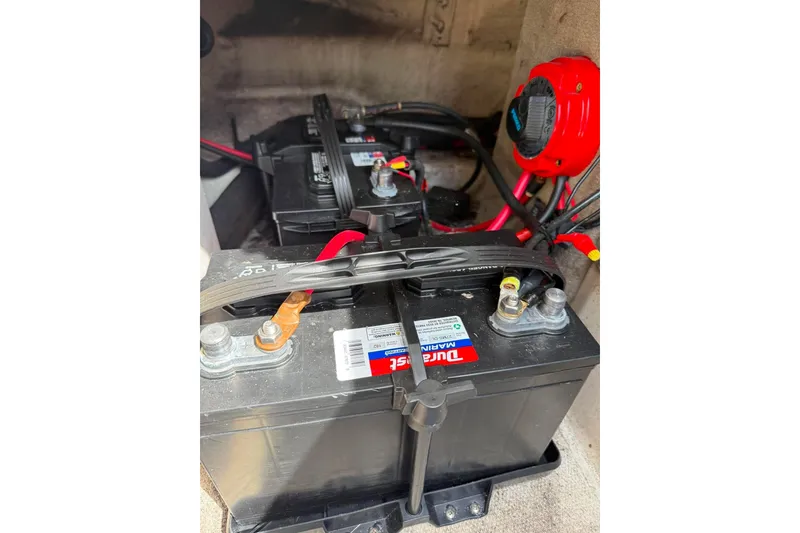 Slide: The Image of Marine battery setup in a 2006 Sea Ray 220 Select boat. - 23