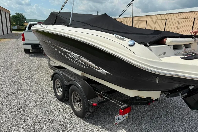 Slide: The Image of 2006 Sea Ray 220 Select boat on trailer, covered and ready for transport. - 4