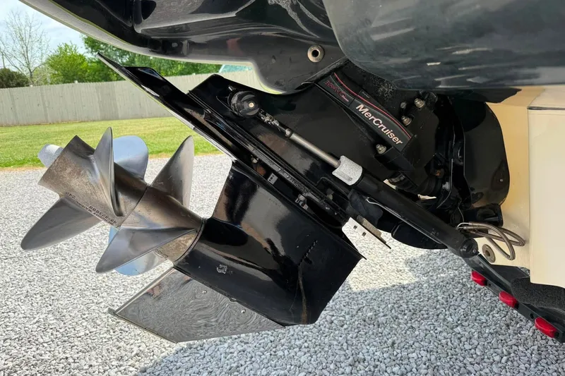 Slide: The Image of Close-up of a 2006 Sea Ray 220 Select boat's MerCruiser outdrive and propeller. - 15