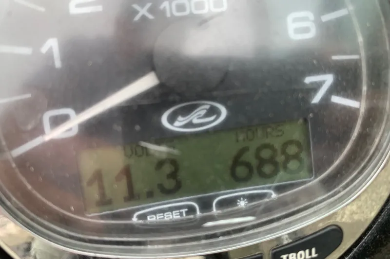 Slide: The Image of Close-up of a 2006 Sea Ray 220 Select boat gauge displaying 688 hours. - 20