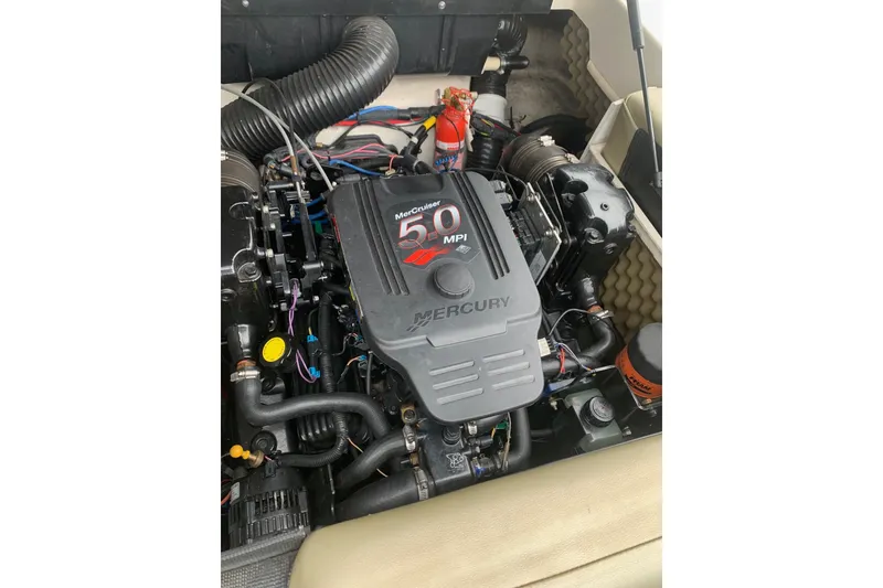 Slide: The Image of Engine compartment of a 2006 Sea Ray 220 Select with MerCruiser 5.0 MPI engine. - 21