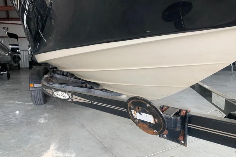 Slide: The Image of 2006 Sea Ray 220 Select boat on trailer in storage facility. - 18