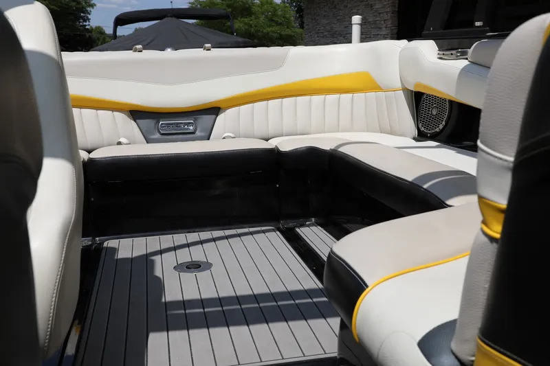 Slide: The Image of 2014 Malibu Wakesetter 22 MXZ interior with stylish seating and modern design. - 8