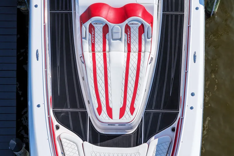 Slide: The Image of Top view of 2016 MTI V42 boat with red and white seating. - 4