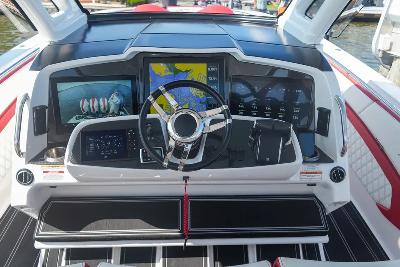 Slide: The Image of Dashboard of a 2016 MTI V42 boat with advanced navigation and control systems. - 8