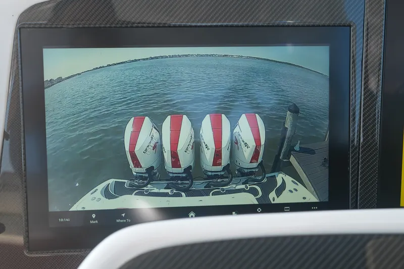 Slide: The Image of Display screen showing four outboard motors on a 2016 MTI V42 boat. - 11