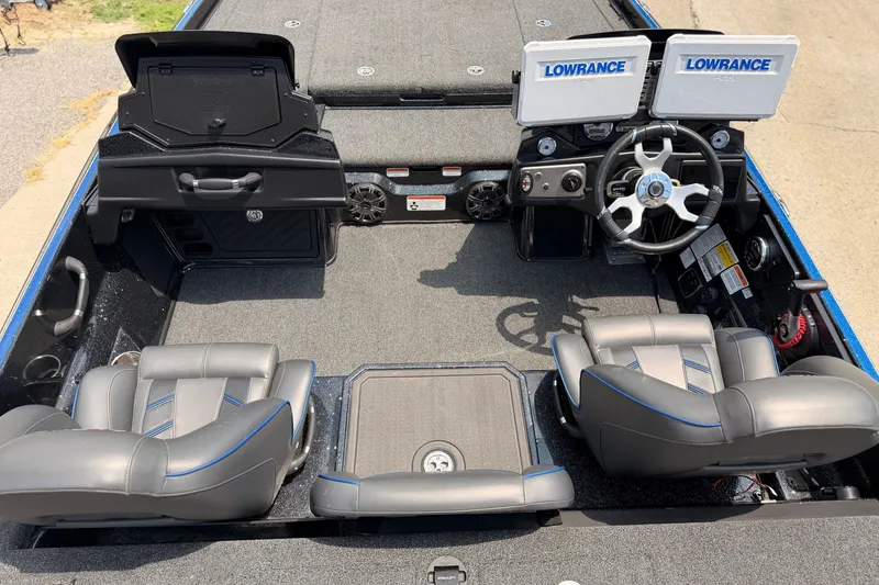 Slide: The Image of 2024 TRACKER NITRO Z21XL boat interior with dual Lowrance displays and steering wheel. - 11