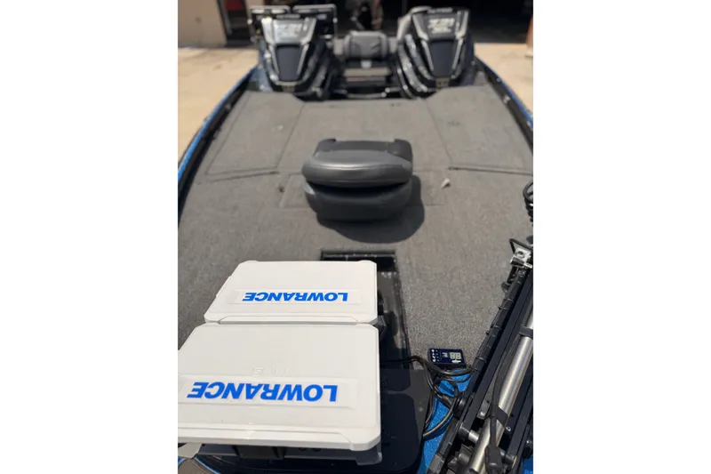 Slide: The Image of 2024 TRACKER NITRO Z21XL boat interior with Lowrance electronics and seating. - 8