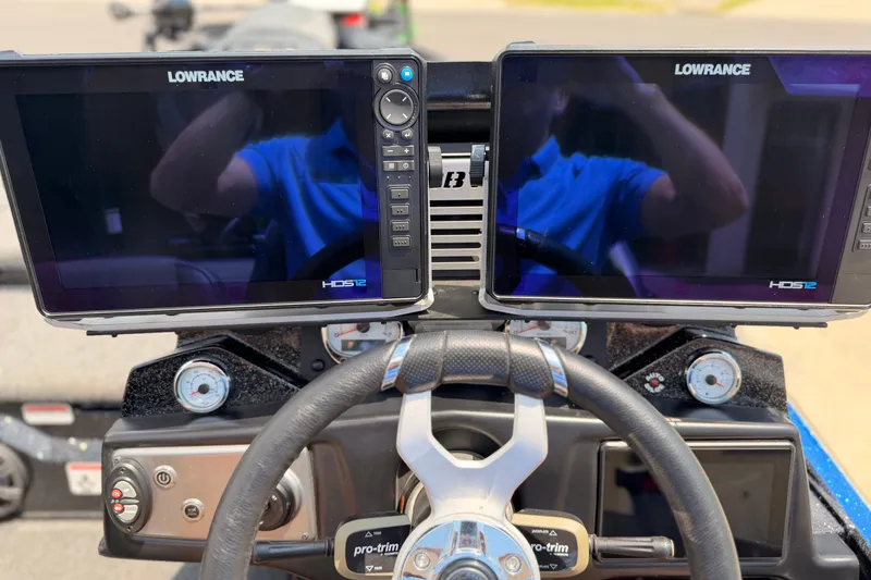 Slide: The Image of Dashboard of 2024 TRACKER NITRO Z21XL with dual Lowrance HDS12 displays. - 12