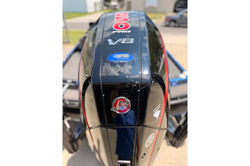 Slide: The Image of 2024 TRACKER NITRO Z21XL boat engine, featuring a powerful V8 design. - 6