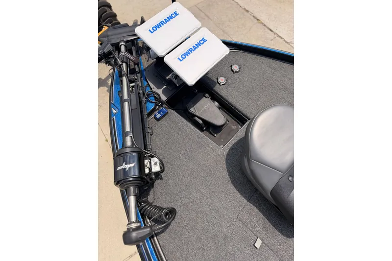 Slide: The Image of 2024 TRACKER NITRO Z21XL boat deck with Lowrance electronics and trolling motor. - 9