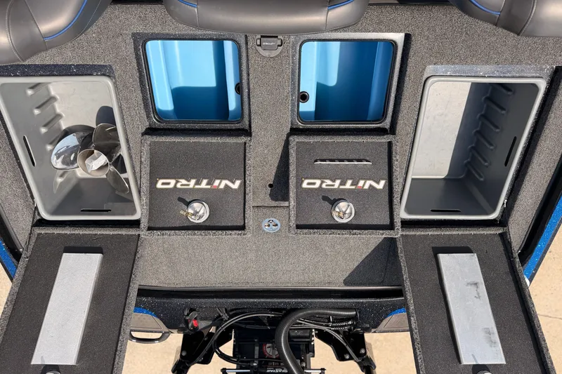 Slide: The Image of 2024 TRACKER NITRO Z21XL boat storage compartments and seating area. - 21