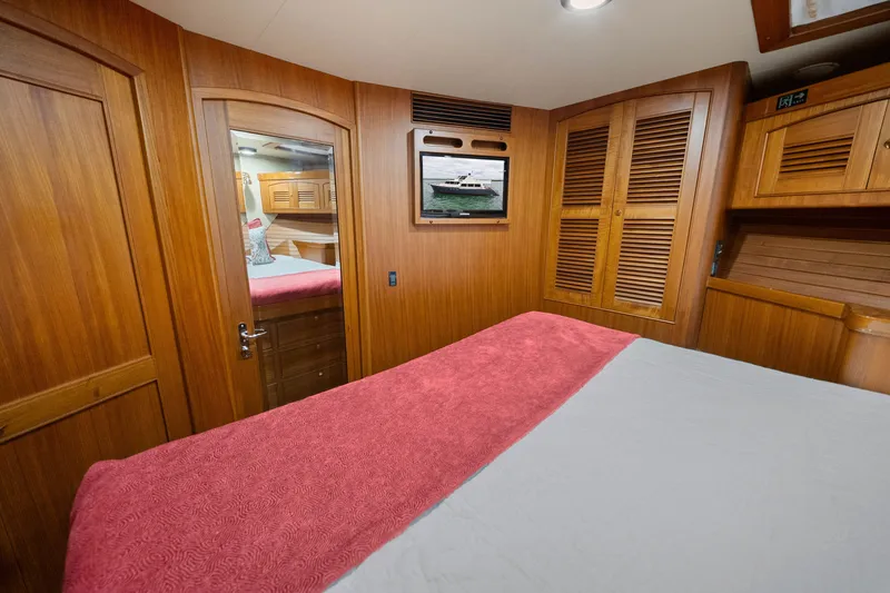 Slide: The Image of Luxurious cabin interior of 2011 Marlow Explorer 70E yacht with wooden finishes. - 39