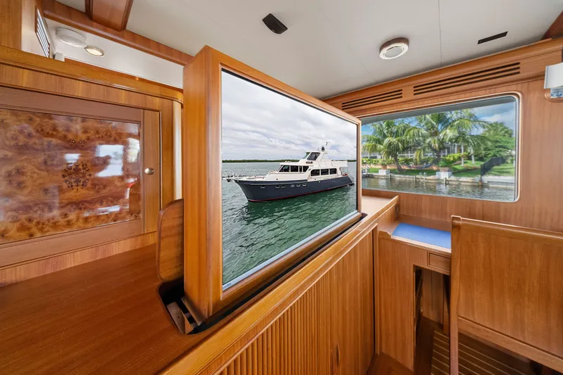 Slide: The Image of Luxurious interior of 2011 Marlow Explorer 70E yacht with wood finish and scenic views. - 29