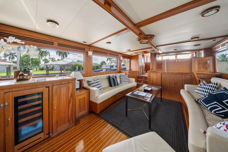 Slide: The Image of Luxurious interior of 2011 Marlow Explorer 70E yacht with elegant wood finishes and plush seating. - 26