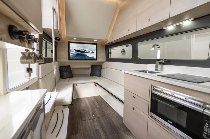 Slide: The Image of Luxurious interior of 2022 Scout 425 LXF yacht with modern kitchen and seating area. - 37