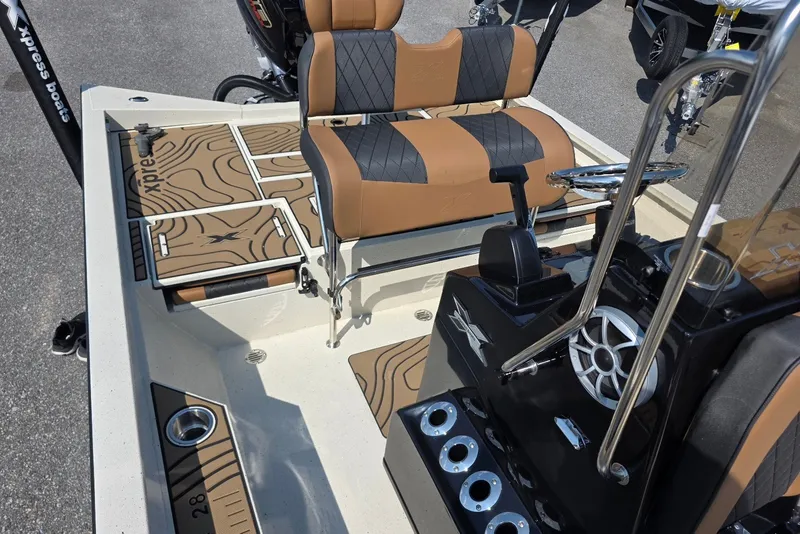Slide: The Image of 2027 Xpress H22B Bay boat interior with stylish seating and modern console design. - 9