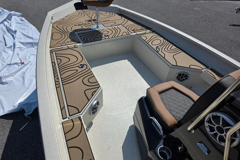 Slide: The Image of 2027 Xpress H22B Bay boat interior with stylish seating and modern design. - 6