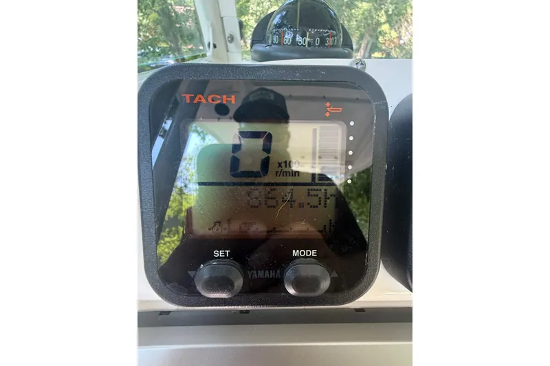 Slide: The Image of Digital tachometer display on 2011 Everglades 230 Center Console boat. - 15