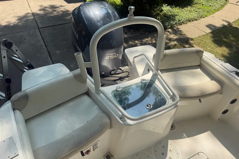 Slide: The Image of 2011 Everglades 230 Center Console boat interior with Yamaha 250 engine. - 10