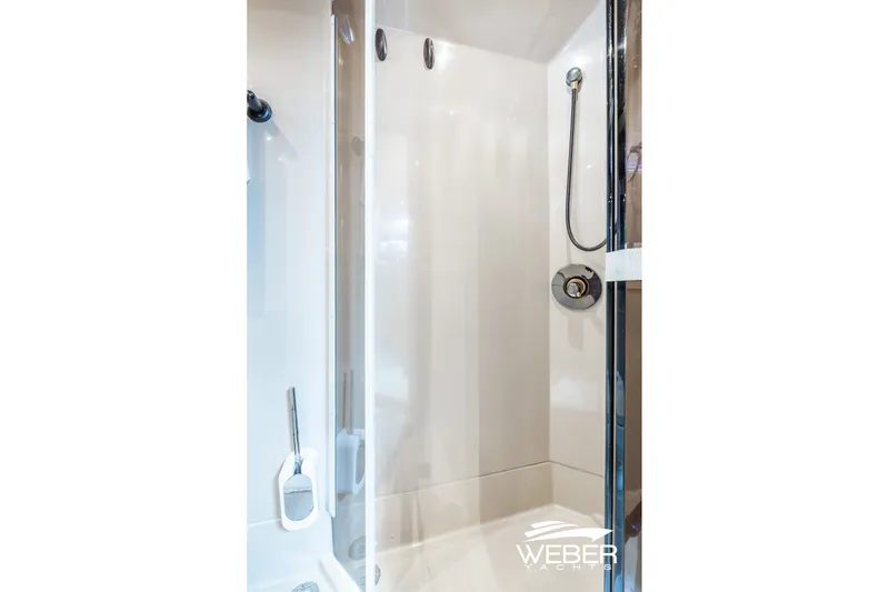 Slide: The Image of Shower area in 2001 Cruisers Yachts 3870 Express, featuring sleek design and modern fixtures. - 42