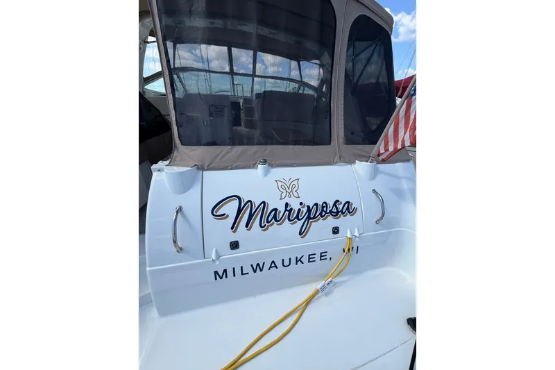 Slide: The Image of 2001 Cruisers Yachts 3870 Express named "Mariposa" docked in Milwaukee. - 6