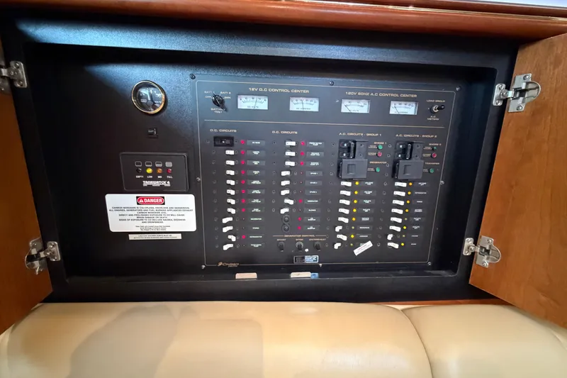 Slide: The Image of Electrical control panel inside 2001 Cruisers Yachts 3870 Express boat. - 29