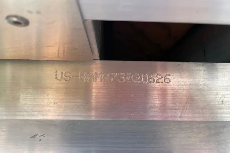 Slide: The Image of Close-up of a 2026 Harris Cruiser 210 SLDH hull identification number. - 20